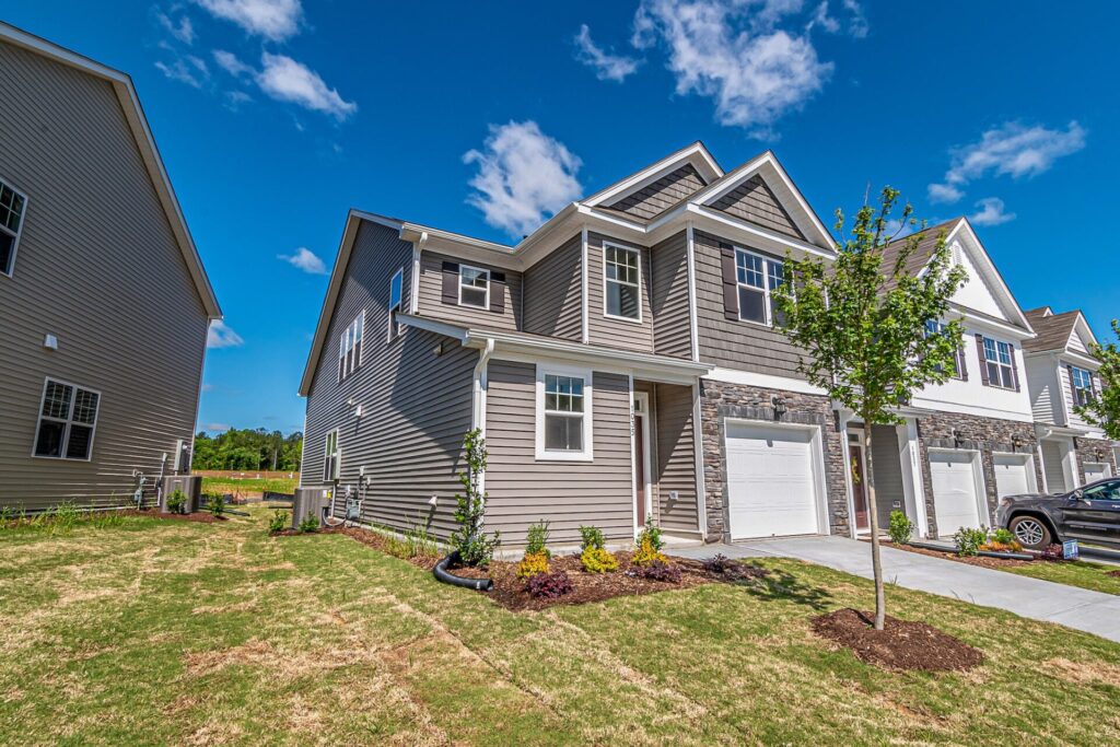 Beautiful Houses Under Blue Sky : Property Advertising Tactics in Real Estate Marketing